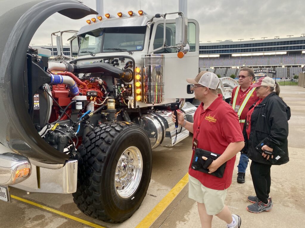 Judges inspecting a truck