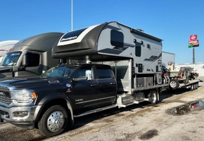 Rudy Yakym's 2022 Ram 5500 flatbed outfitted with truck camper