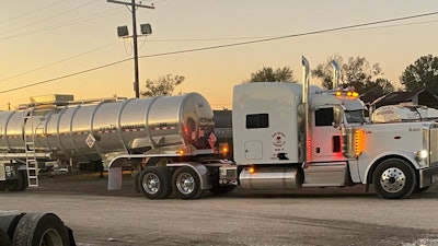 A Pete 389 hauling a shined up tanker trailer -- this is Dana Gardner Trucking's bread and butter.