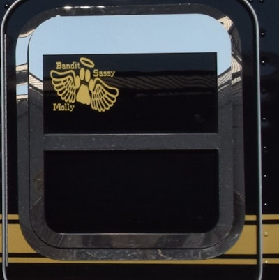 The pups' names with this graphic are shown on the driver-side sleeper window.